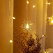 Atârnând fulgi de zăpadă lanț luminos - lumină caldă